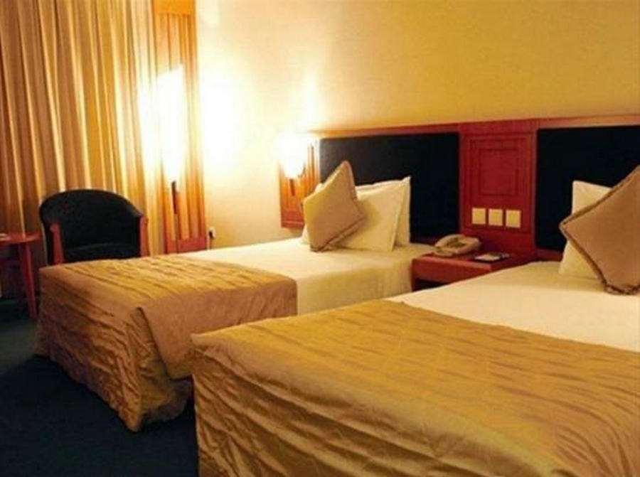 Beijing Wuhuan Hotel Room photo