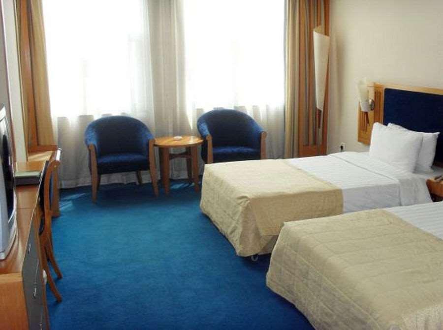 Beijing Wuhuan Hotel Room photo
